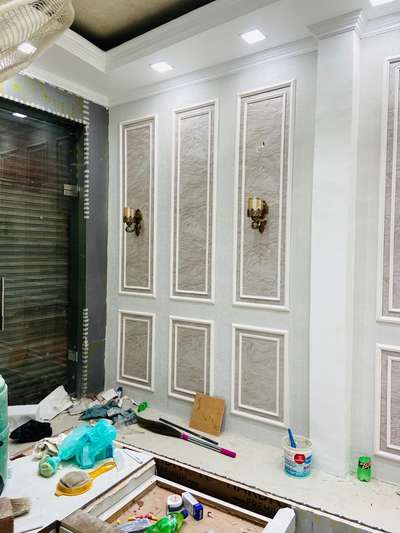 French moulding with wallpaper for a decent look. For more details or costing pls contact -9999937300