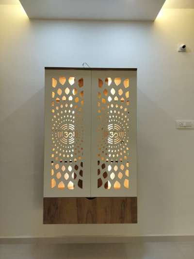 Customised Modular Pooja Unit Design 

Material: Particle Board with Door cnc design (Multiwood)