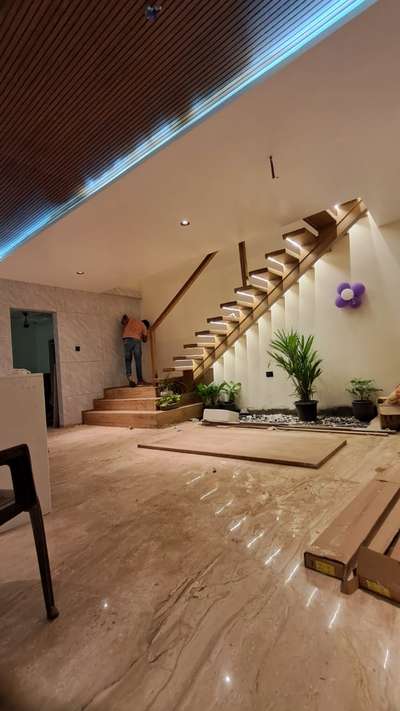 GI Metal Frame works staircase Finished with Teak Wood Based with plywood with LED sensor lights