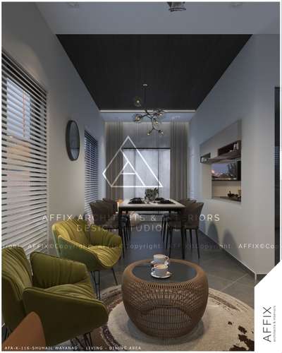 Minimalist walls, bold ceilings, and cozy seating, creating a seamless flow between living and dining. A space designed for both style and simplicity. Modern living, redefined with quiet confidence. #Architect  #architecturedesigns  #Architectural&Interior  #kerala_architecture  #architecturekerala  #best_architect