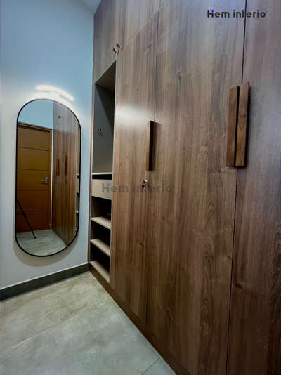 Wardrobe 

 #wardrobe  #mirrorunit  #framedmirror  #bedroominteriors  #woodenfinish  #capsuleshape