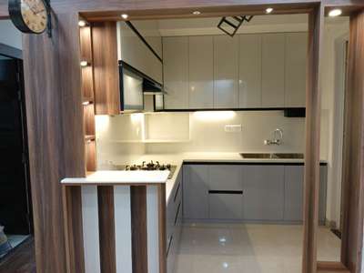 *modular kitchen*
modular kitchen complete laminate finish with SS basket.