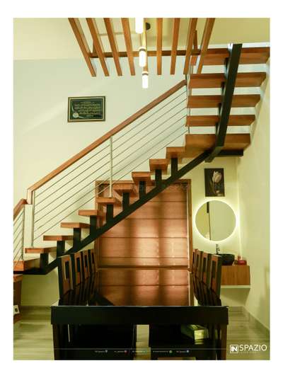 Dining space under the floating staircase.
Client : Mr. Safwan@ Mukkudu.