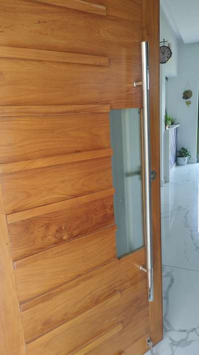 #TeakWoodDoors 
finished project at nedumbassery