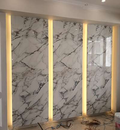 # High gloss mica panelling with cove lighting .