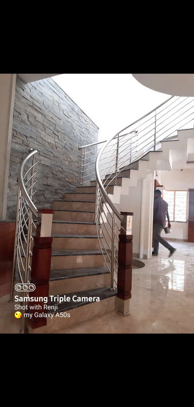 Spiral Staircase.Master Leg Wood&Steel Finish.. #mallappally  #homeowners  #Pathanamthitta  #Kottayam #Alappuzha  #StainlessSteelBalconyRailing