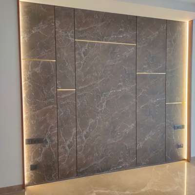 stone wall panelling with light effect and Metal insert
 #WALL_PANELLING  #stonework  #interior  #drawingroom  #viralpost #light