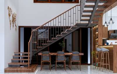 ✨ Modern elegance meets warmth — where design flows seamlessly from the staircase to the dining. Minimal, classy, and full of life. 🍃 #koloapp 

Hashtags:
#InteriorDesign #ModernHome #StaircaseDesign #DiningSpace #WoodFinish #HomeDecor #KoloApp #InteriorInspiration #HomeDesign #LuxuryInteriors #MinimalDesign #ArchitectureLovers #DesignGoals #kerala_homestyle
