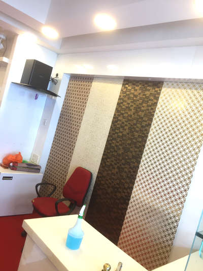 reception back wall paneling by charcoal seat