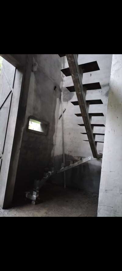 work site at Thrissur central beam stair with ms plates.