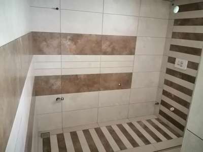 #BathroomTIles #BathroomDesigns #FlooringTiles #GraniteFloors #FlooringSolutions #Alappuzha #site@alappuzha