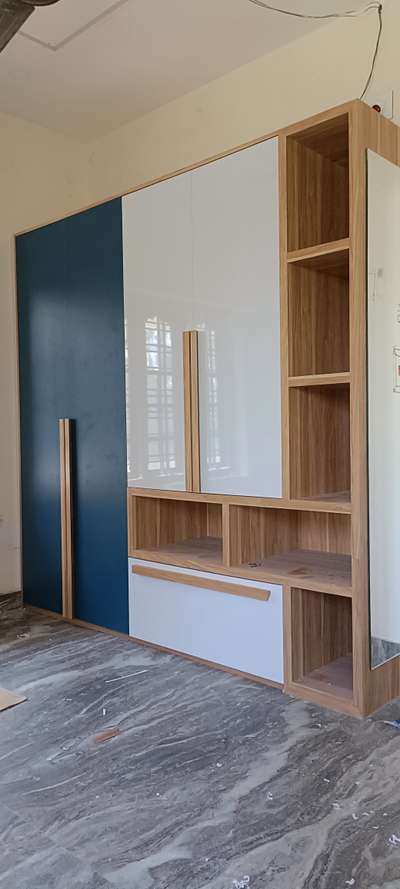 Wardrobe 

 #wardrobe
 #WardrobeIdeas  #WardrobeDesigns  #CustomizedWardrobe  #wardrobeinteriors  #4DoorWardrobe  #InteriorDesigner  #interiorsmodernhomes  #HomeDecor  #customdesign  #handmade  #micalaminates  #mirrorunit  #artwork  #thrissurinterior  #Thrissur  #InteriorDesigner  #Architectural&Interior