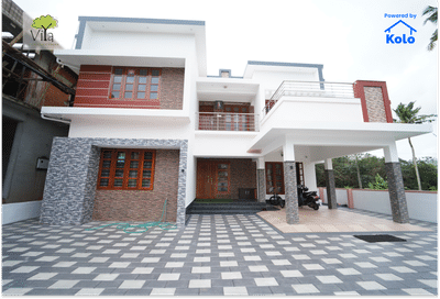 Contemporary style 4-bedroom masterpiece
2257sq.ft|4bhk|Contemporary style| double storey|Full home|kottayam

Client: Chacko Thomas
Location:Thiruvalla

Design and Execution: Viya Constructions
Branding partner: Kolo app

 #exterior_Work #ElevationHome #modernelevation #ContemporaryHouse #DiningChairs #DiningTable #contemporaryelevation #BedroomDecor #LivingroomDesigns #livingarea #viyaconstructions #turnkey