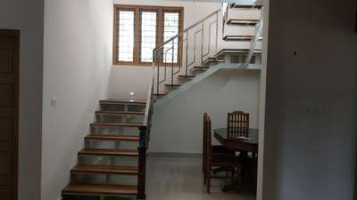 GI framed wood stair with steel handrail...