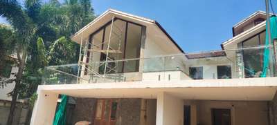 Balcony   steel with toughen glass site at peruthalmanna