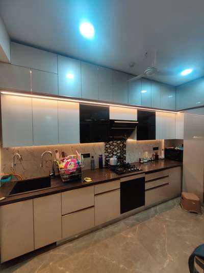 modular kitchen in acrylic finish  #ModularKitchen  #modularwardrobe  #Modularfurniture  #KitchenInterior