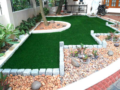 # products used for work artificial grass, pebbles, Natural stone, aglonima plant varieties