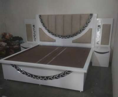 *Double bed with cousion*
 Double bed (6X6). storage available. Good quality febric and meterial.