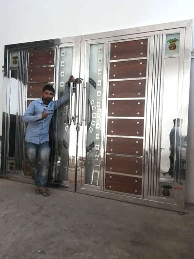nizssfebrication
stainless Steel gate with FunderMax
low price best quality good work 
 #9999235659saifi 🤙