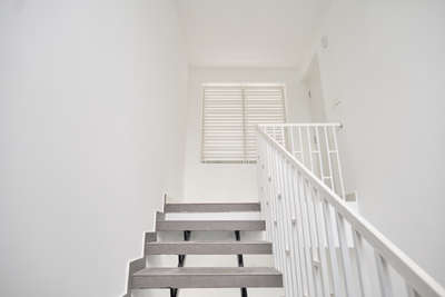 A seamless blend of form and function. This staircase was designed and executed entirely by our in-house team, focusing on clean lines, safety, and timeless aesthetics. #StaircaseDecors #InteriorDesigner #Architect #Contractor