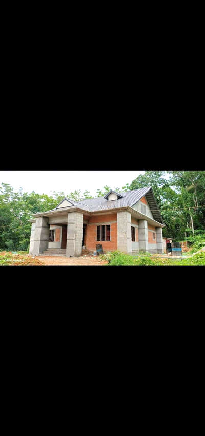 18 ലക്ഷം എസ്റ്റിമേറ്റ് വരുന്ന 1200Sqft ജർമൻ സ്റ്റൈൽ വീട്‌, ഗുരുവായൂർ മമ്മിയൂരിൽപ്രവാസിയായ ശ്രീ ജേക്കബ് ആന്റണി യുടെ വീടാണിത്.... #KeralaStyleHouse #lowbudgethousekerala