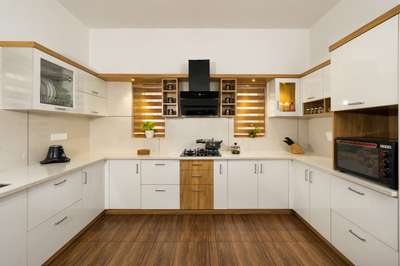 C shape white and wooden kitchen  #whitekitchen  #WoodenKitchen  #Cshapekitchen  #ModularKitchen  #moderndesign