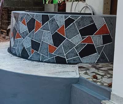 Finished tile work on side o well