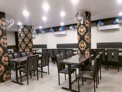 Restaurant Sofa and interior work with wall paper design