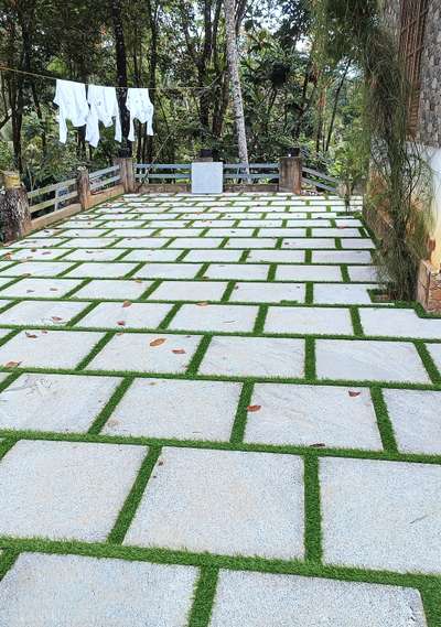 2×2 Halfcut Bangalore stone designed at Pampady #Landscape  #customer  #we_are_moving_forward_with_happy_customers  #LandscapeDesign