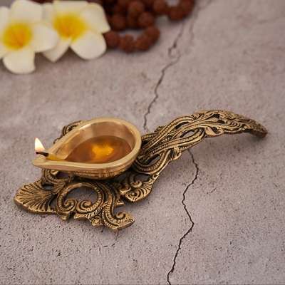 You can complete the decor for any of your celebrations in the unique style. This authentic diya is artistically crafted and engraved in beautiful manner. It has an ample space to keep oil in it and due to the handle it does not burn your hands while performing Aarti.
#brassdiya #brass #antique #decor #decortwist #instagood #instagram #instalike #instadaily #instamood #photooftheday #photography #india #noida #decorshopping