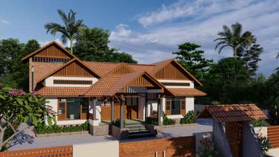 The home is inspired by Kerala’s traditional architecture, featuring pitched terracotta roofs, wooden gables, stone plinths, and shaded verandahs. Designed for natural light and ventilation, it responds thoughtfully to the local climate. Using earthy tones and materials like clay tiles, laterite, and timber, the house blends beautifully with its tropical setting. It’s a modern take on Kerala’s timeless, sustainable, and grounded architectural values.
 #vernaculardesign  #sustainableliving  #climateresponsive