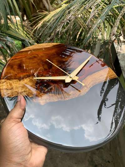 Glossy epoxy clock and teak wood..up for sale #resin  #resintable  #epoxy  #epoxyresintable  #epoxycoating  #epoxydining  #epoxyfurniture  #Homedecore  #epoxytablekerala  #clocks  #InteriorDesigner  #epoxytables  #resintable  #resinart  #teakwood  #TeakWoodDoors  #Teapoys  #CoffeeTable  #teak_wood  #teakwoodchair