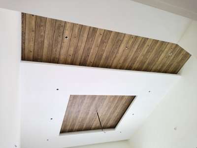 #wall papers in ceiling looks like original wood panel work