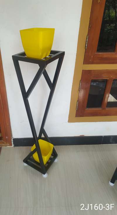 METAL STAND FOR INDOOR PLANTS.
 
Durable, Eco friendly. Rest free, Not harmful for any floor, Adjustable legs for leveling.