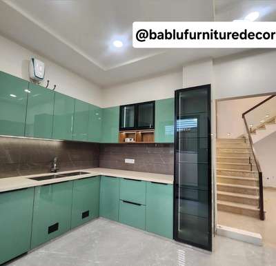 utilisation of your space with best kitchen design  
contact- 9928334684 #Carpenter #WoodenBalcony #LShapeKitchen #KitchenIdeas #greenlamemica_ #crockeyunit #turnkey