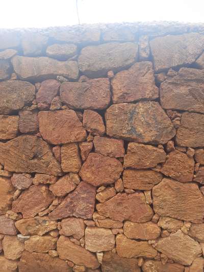 BOUNDARY WALL WITH UNSHAPE LATERITE