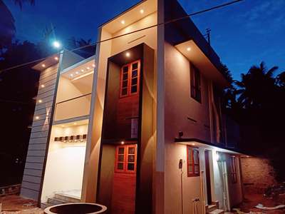 Castle Builders and Architects
Thiruvananthapuram
Our Finished site  at Venganoor
 call us for new house construction 

Dream Home Construction in your own Property.
Construction cost-33 lakhs
4BHK / 1553 SQFT
Interior works-Modular kitchen, Wash area counter unit, Stair Bottom Door.

Ground floor- 830 SQFT (Sitout, 2 Bedrooms with attached Bathrooms, Living cum Dining area, Kitchen, Stair area.)

First Floor- 723 SQFT ( Balcony, 2 Bedrooms with attached Bathrooms, Living area, Open terrace.)

Front main Door with Teak wood and rest all other Doors & Windows with Anjli wood Frames & Mahogany wood shutters .

Floors provided with vitrified Tiles & front steps and inside steps provided with Black Galaxy Granites also handrails with SS pipes and 10mm Glasses. 

For more Details contact

Castle Builders and Architects , Mukkampalamood, Naruvamood P O. Operate & Supervision by Engineers.
#Thiruvananthapuram #venganoor #Kerala