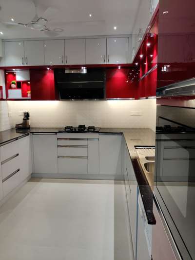 Modular Kitchen  
Acrylic Red + White Combination
#thriviahomes
Thrivia Homes And Interiors, Kochi