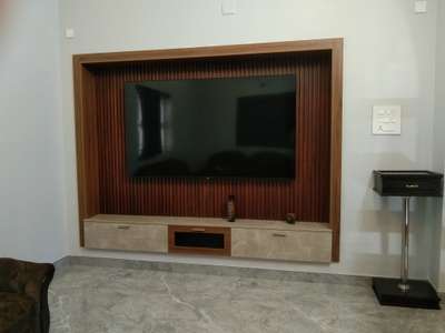 TV UNIT : @ Family Living 

Material : Plywood 
Finish : Lamination 
Back panel : PVC Louvers 


Location : Iringalakuda
.
.
.
.
 #LivingRoomTVCabinet  #tvunits  #LivingRoomTV  #tvbackpaneling  #tvconsole  #tvunit  #tvunitinterior  #Homedecore  #homeinteriorsdesign