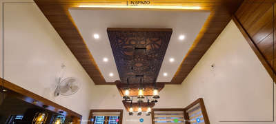 A wooden ceiling design for dining room.