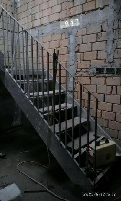 "Crafted elegance on a budget! Our staircase blends industrial chic with natural warmth, featuring a clever combination of GI tube and wood. Minimal cost, maximum style. #metalstair  #homedecor