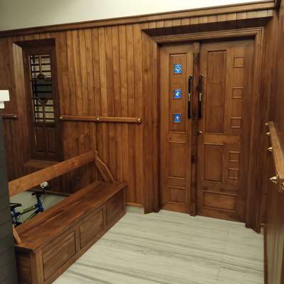 panelling ,front door , bench with teak wood