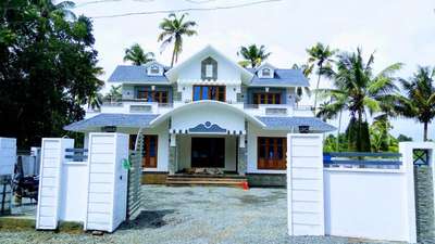 square feet - 2700
double storey
4 bed rooms 
Thrissur
 #HouseDesigns 
 #Designs 
 #lowbudget 
 #ElevationDesign 
 #civilcontractors 
 #CivilEngineer 
 #buildersinkerala 
 #InteriorDesigner 
 #exterior_Work