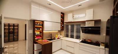 modular  kitchen 1.5 lakh all    kerala service  .meteriyal. 710 grade marin playwood  20 yers guaranty  with mica  3 basket  .with out chimney  and hobe  eny enquiries  please  call and what's 8086429429