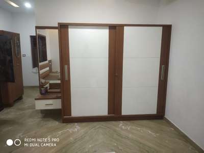 സ്ലൈഡിങ്ങ് അലമാര   #InteriorDesigner #WardrobeDesigns #wadrobes #SlidingDoorWardrobe