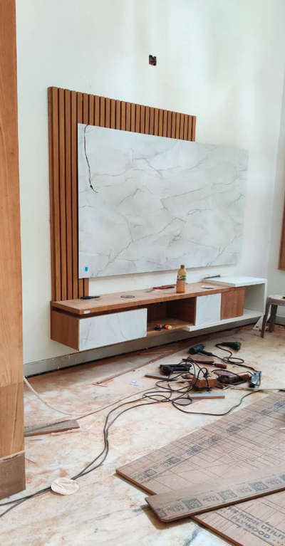 #TVStand  #WALL_PANELLING  #marbledesighn  #woodenfinish  #elegantlook  #newmodal