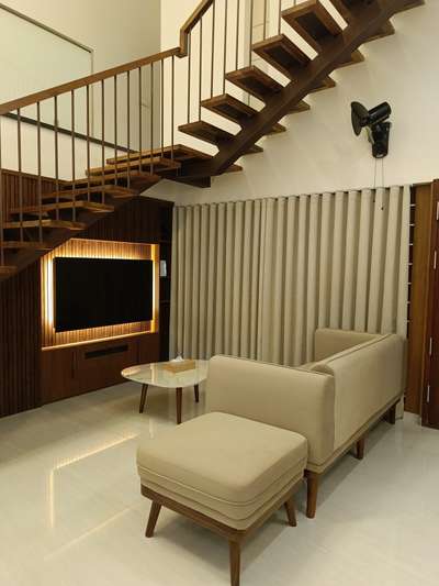 ✨ Custom Interior by Nozo Homes
This beautifully curated space was a fully customized project — thoughtfully designed by Nozo Homes and executed to perfection by NagaHorse.

From the warm wooden staircase and textured wall paneling to the soft-toned furniture and marble-top tables, every detail speaks of modern elegance and subtle luxury.

📍Design by: Nozo Homes
🔨 Execution by: NagaHorse
📸 Tailored living, captured right.