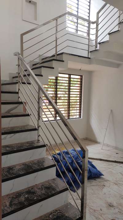 stair work stainless Steel square design 
running feet 700 quality 202
square pipe used 1½,1,⅝pipes are used #StainlessSteelBalconyRailing #KeralaStyleHouse  #Palakkadcarpenter