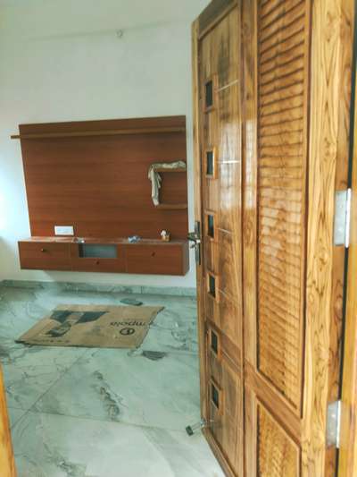 teak wood front door 20K
VM Constructions
Kollam
9895134887