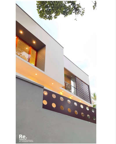 House at pathamkallu in Thiruvananthapuram, Kerala, has been designed by focusing on minimalism. All the amenities and facilities required for a family are arranged in this beautiful house.The exteriors feature the simple yet elegant flat - box style. Designed in 1750 sq ft, this amazing abode has a sit-out, formal and family living areas, dining space, 5 bedrooms and kitchen with a work area.The house stands on 4.5 cents.

Clients: Mr.Ajimkhan and Mrs.Sabeenabeevi
Location: Pathamkallu, Thiruvananthapuram 
Floor area : 1750Sqft
Site area : 4.5 Cent
Completion year : 2025

#design #architecture #archilovers #housedesign #interiordesign #architectural #homedecor #art #exteriordesign #designdeinteriores #smallhouse #budgethousing #archidaily #picoftheday #artcollector #civil #construction #residentialdesign #minimalism #artoftheday